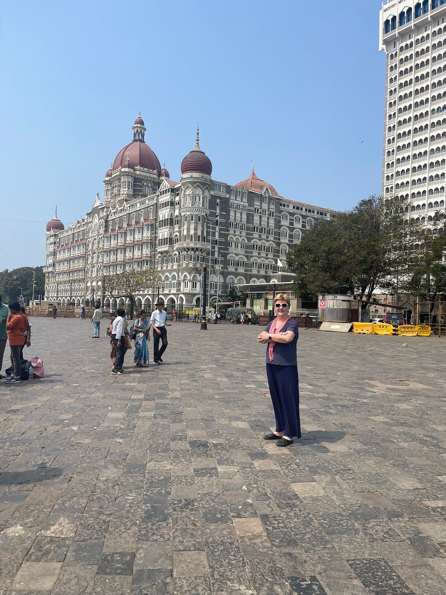 A guest in front of the Taj Mahal Palace Hotel
