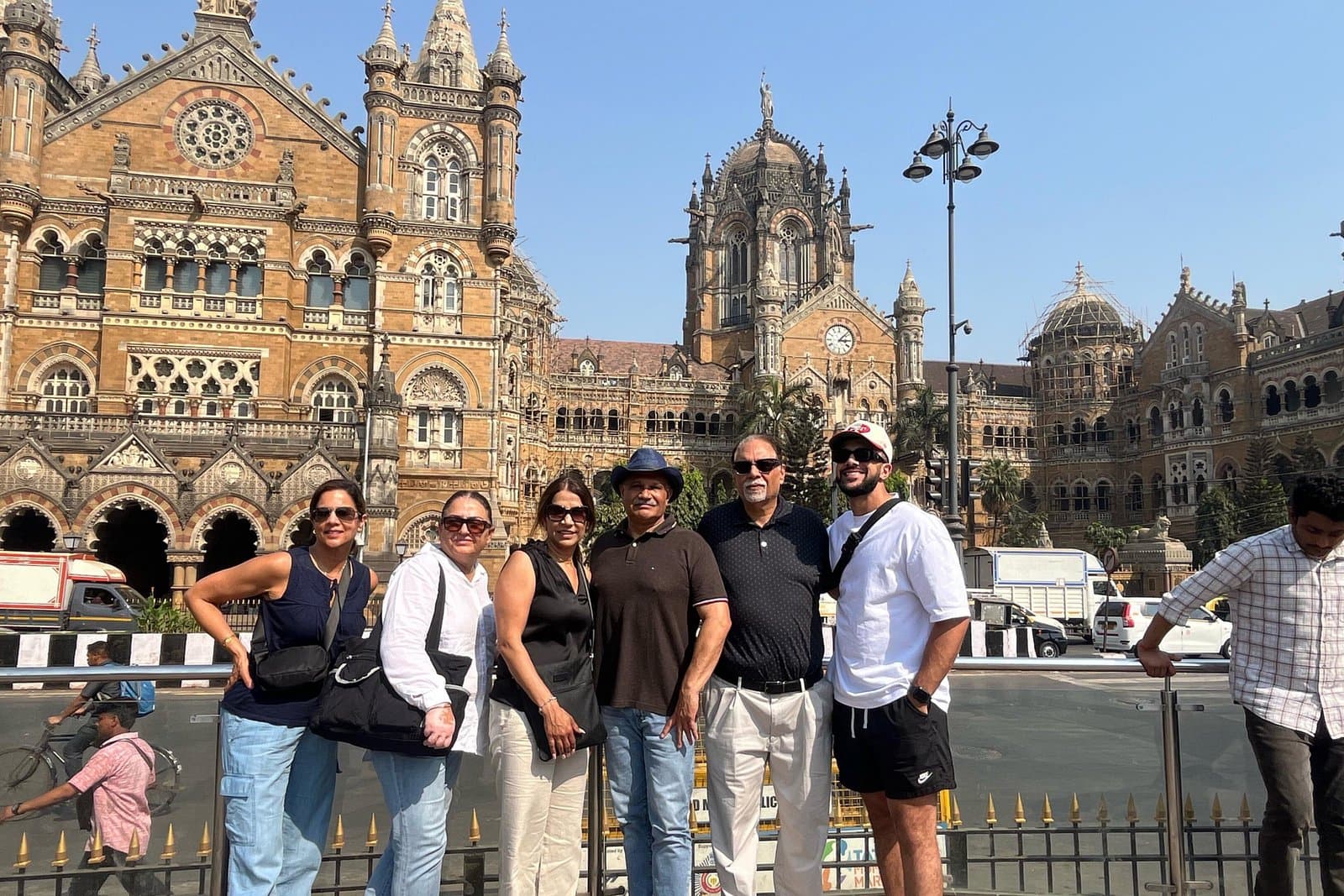 A tour group outside Chhatrapati Shivaji Maharaj Terminus