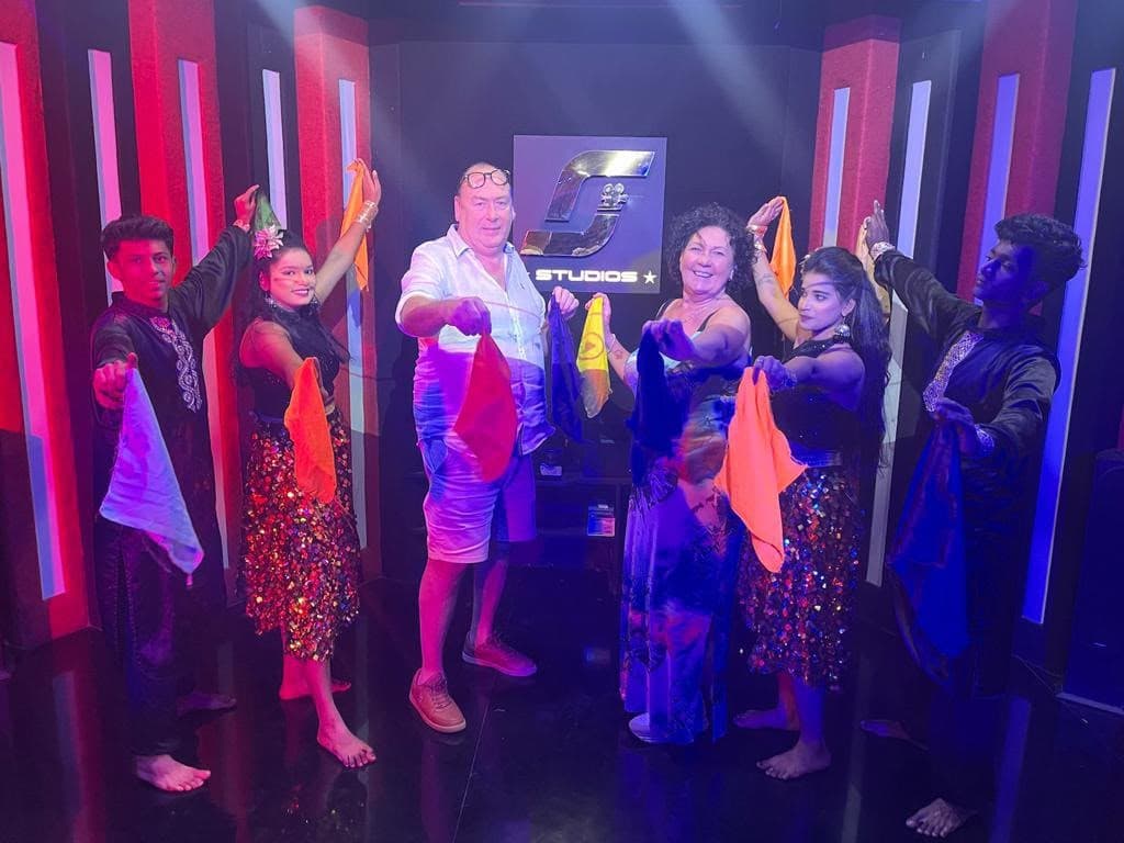 Guests in costume at a Bollywood dance studio