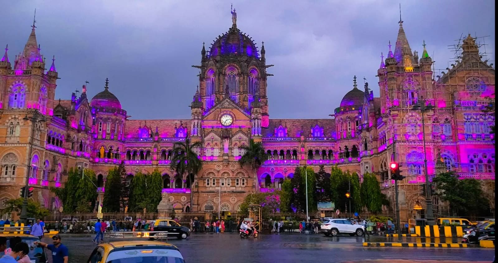 Chhatrapati Shivaji Terminus lit purple at dusk