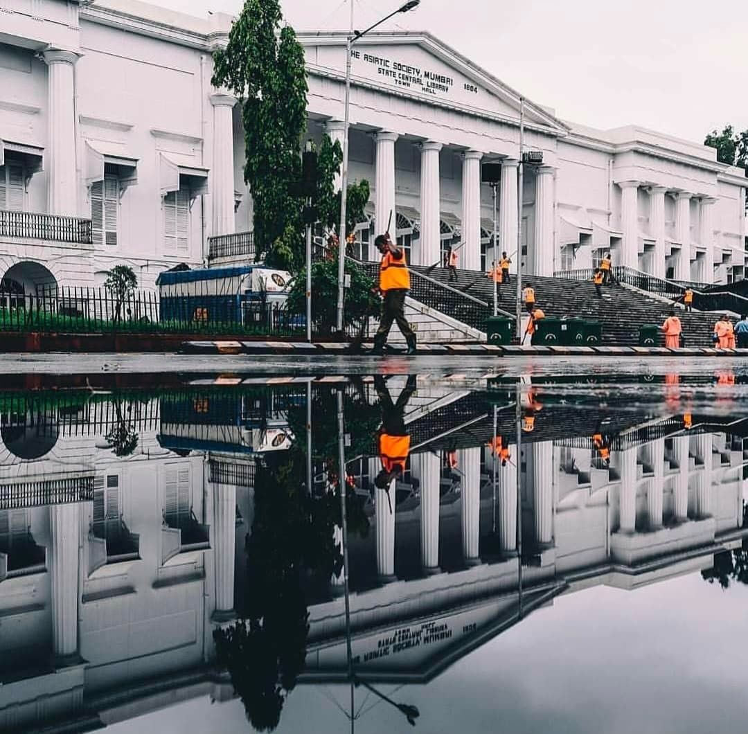 The Prince of Wales Museum reflected after rain