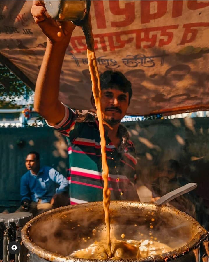 Cutting chai being poured at a street stall