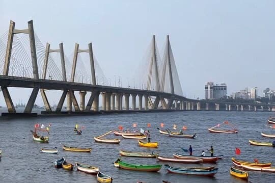 Fishing boats beneath the Bandra–Worli Sea Link