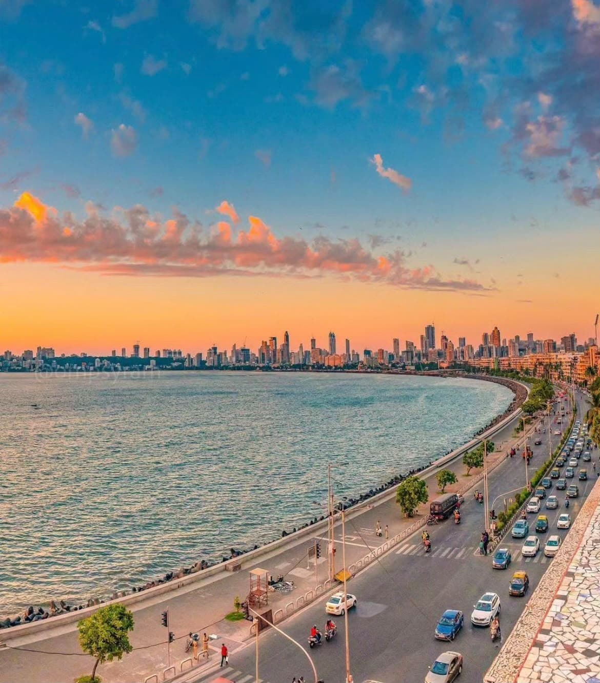 Marine Drive curving along the bay at sunset