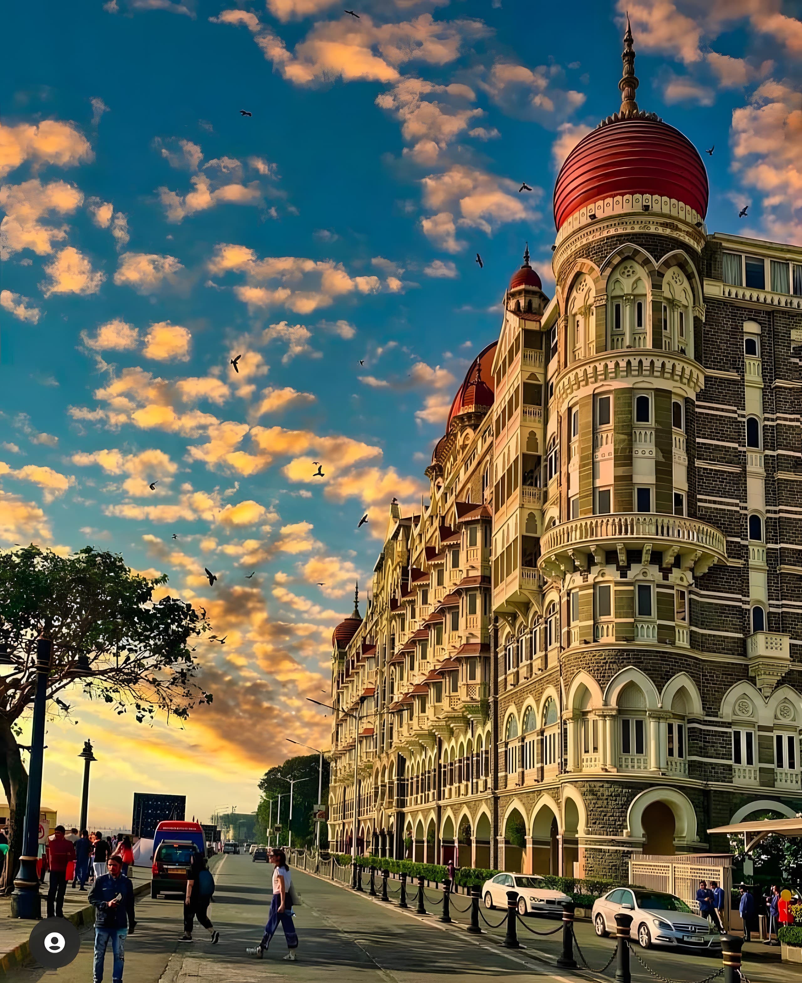 The Taj Mahal Palace Hotel under a dramatic sunset sky